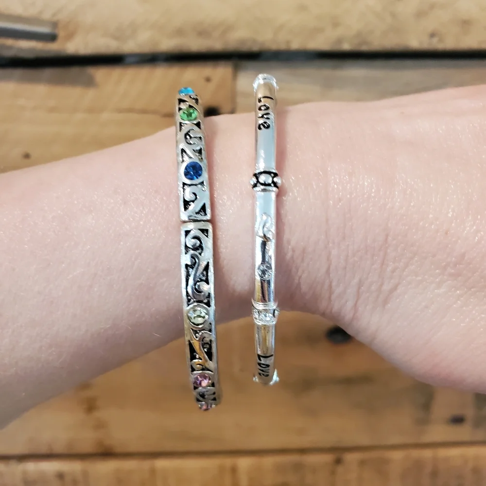 Set of 2 silvertone elastic bangles w/ pastel rhinestone details, love, hearts